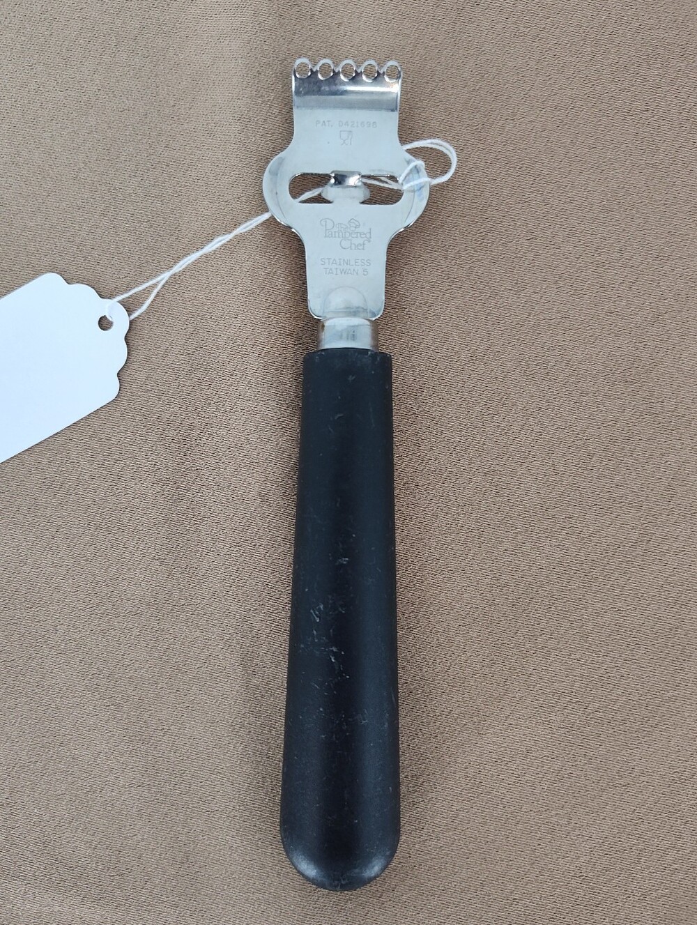 Pampered Chef Stainless Steel Zester with Black Plastic Handle